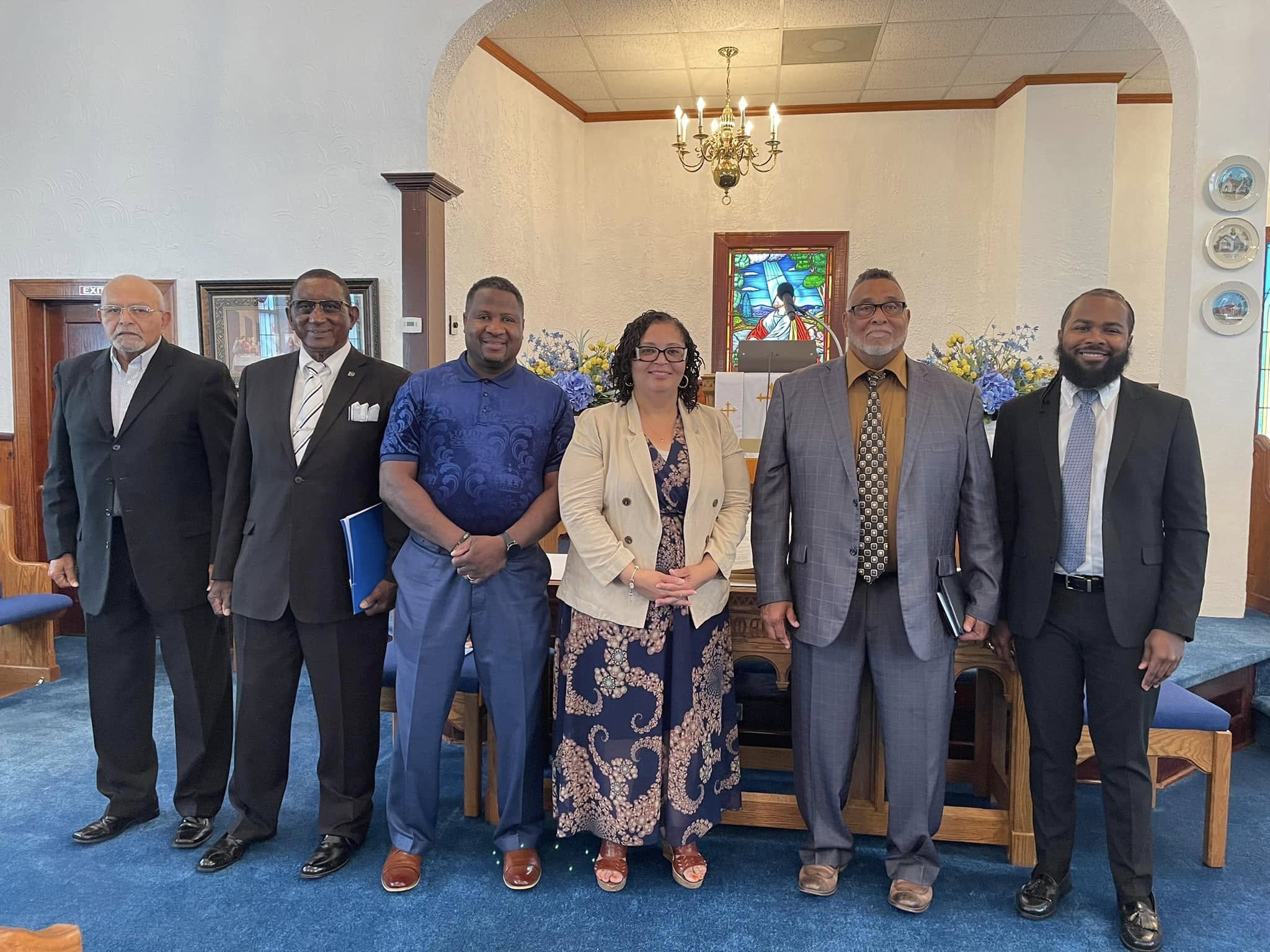 Church leadership group photo near altar